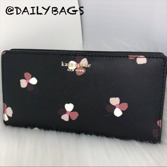 kate spade Handbags - KATE SPADE LARGE SLIM BIFOLD WALLET DUSK BUDS NWT